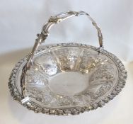An unusual circular Georgian silver cake basket wi