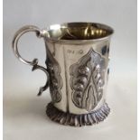 A good Victorian silver christening cup on spreadi