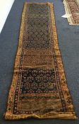 A small Oriental runner. Est. £25 - £35.