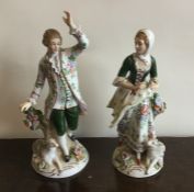 A pair of German decorative figures in bright colo