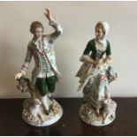 A pair of German decorative figures in bright colo