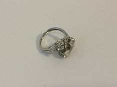 A French Art Deco two stone diamond cocktail ring