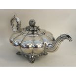 A good heavy Victorian silver teapot of melon desi