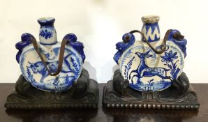 A pair of unusual Continental blue and white scent
