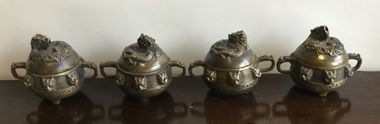 A good set of four Chinese brass censuses, the lif