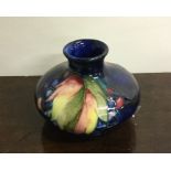 MOORCROFT: A stylish blue ground vase of squat for