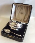 An Edwardian cased silver christening bowl and spo