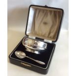 An Edwardian cased silver christening bowl and spo