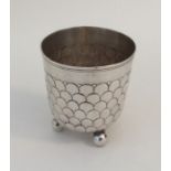 An 18th Century German silver beaker with textured