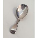 A Victorian silver fiddle pattern caddy spoon of p