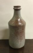 ROGER COLLET: A stoneware vase / bottle. Marked to