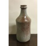 ROGER COLLET: A stoneware vase / bottle. Marked to