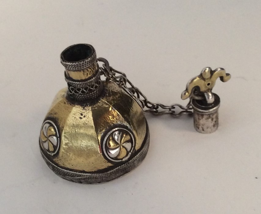 An Antique silver and silver gilt scent bottle. Ap