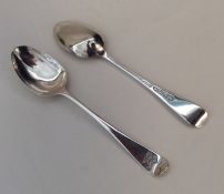 DUBLIN: A pair of crested silver teaspoons. By Wes