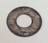 An unusual circular silver plaque decorated with H