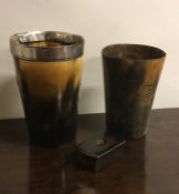 A silver and horn mounted tapering beaker etc. Est
