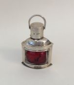 An unusual Victorian silver lighter in the form of