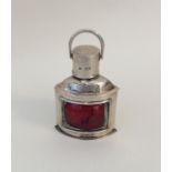 An unusual Victorian silver lighter in the form of