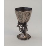 An unusual Dutch six sided silver cup on spreading
