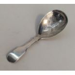 A Victorian silver fiddle pattern caddy spoon with