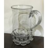 A Georgian glass tankard with reeded handle on spr
