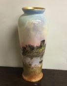 A Royal Doulton baluster shaped vase painted with