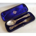 A cased silver Kings' pattern two piece christenin