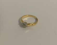 An 18 carat diamond daisy head cluster ring in pla