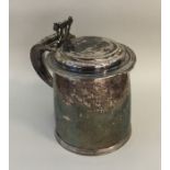 A rare Charles II flat top silver lidded tankard w