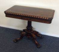 A good quality Victorian rosewood card table on fo