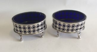 A pair of Edwardian silver pierced salts with BGLs