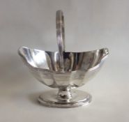 A Victorian silver bright cut sugar bowl with swin