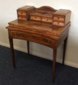 An attractive walnut hinged top lady's desk with b