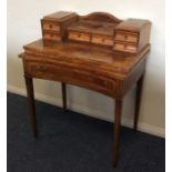 An attractive walnut hinged top lady's desk with b