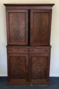 A good Georgian mahogany cupboard with shelved int