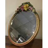 A large circular Barbola mirror. Est. £30 - £50.