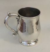 A George II Britannia standard silver tankard on t