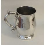 A George II Britannia standard silver tankard on t