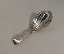 EXETER: A rare silver fluted caddy spoon of fiddle