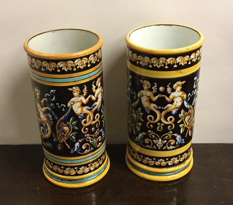 A pair of attractive black and yellow ground vases
