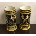 A pair of attractive black and yellow ground vases