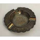 A Chinese silver ashtray of circular form. Approx.