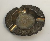 A Chinese silver ashtray of circular form. Approx.