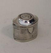 A Dutch silver spice box with reeded decoration. A