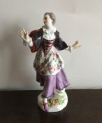 A Meissen figure of a dancing girl on floral base.