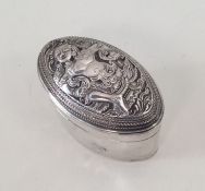 An unusual oval Burmese silver box attractively de