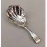 EXETER: A fiddle pattern silver caddy spoon with f