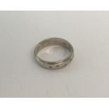 A diamond five stone band ring in white gold. Appr