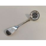 A fiddle pattern silver sifter spoon with crested