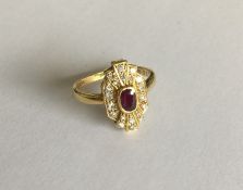 An 18 carat gold ruby and diamond Art Deco style c